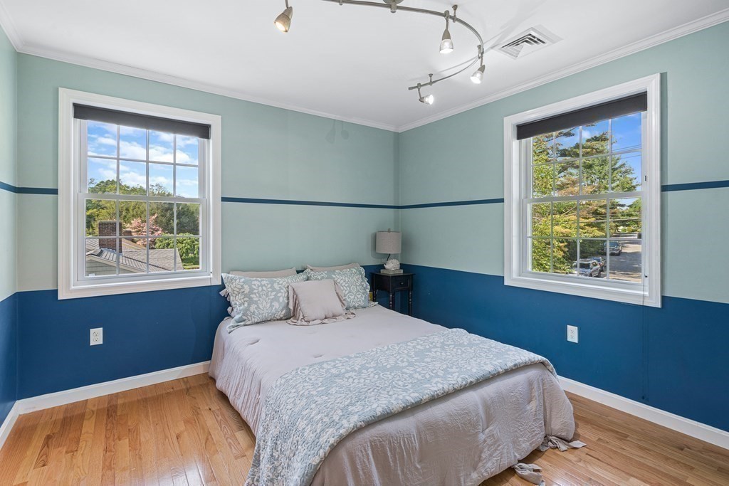 146 Ridge Street Winchester, MA 01890 - Photo 22 of 40 a bedroom with a bed and a window