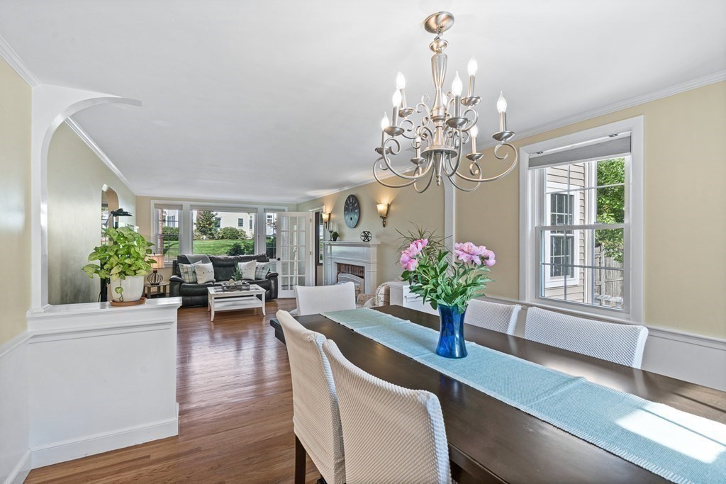 146 Ridge Street Winchester, MA 01890 - Photo 3 of 40 a view of a dining room with furniture and a chandelier