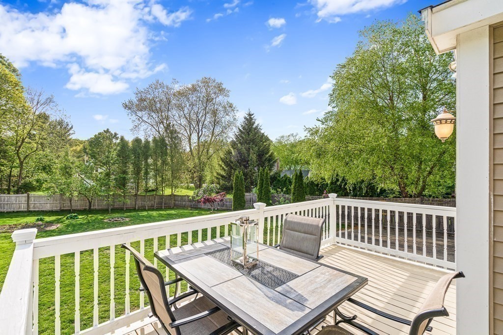 146 Ridge Street Winchester, MA 01890 - Photo 34 of 40 a view of a patio with wooden floor
