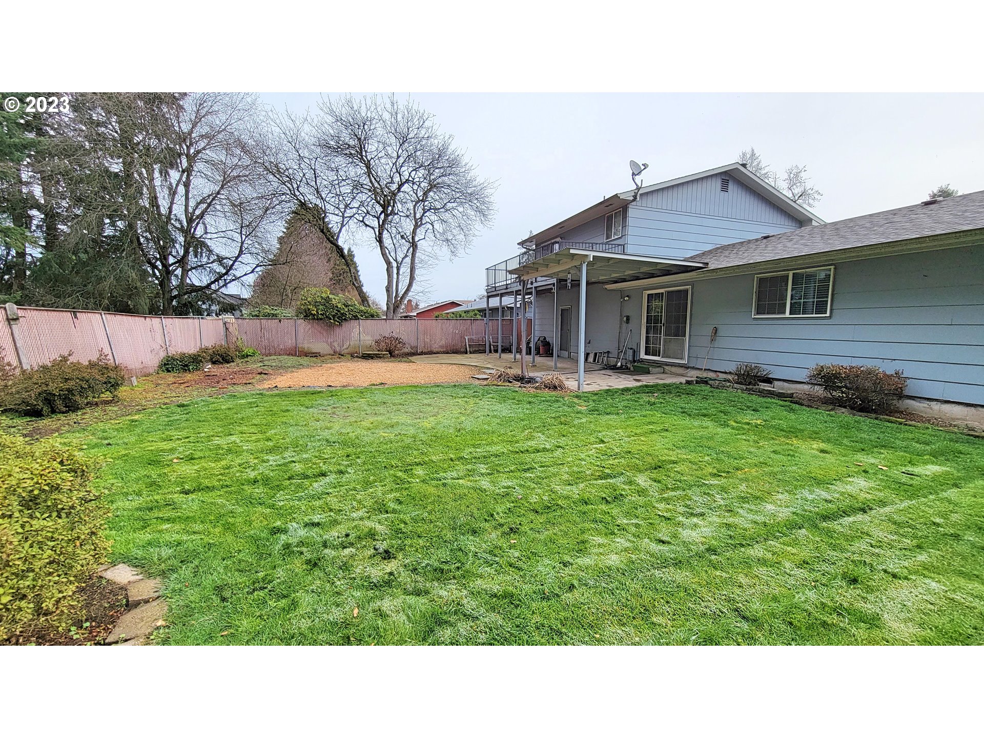 726 Rayner Avenue Springfield, OR 97477 - Photo 17 of 19 a black and white house with a yard