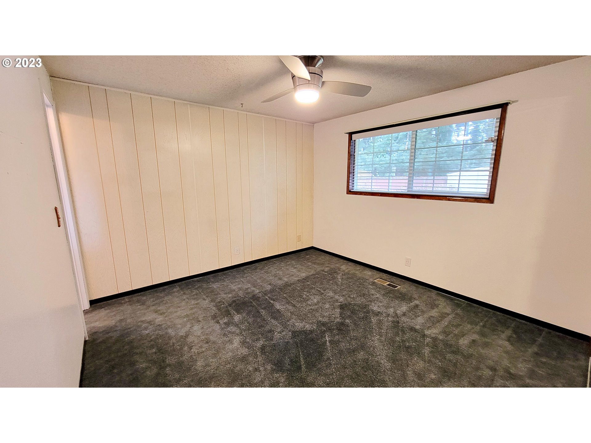 726 Rayner Avenue Springfield, OR 97477 - Photo 5 of 19 a black and white photo of a room