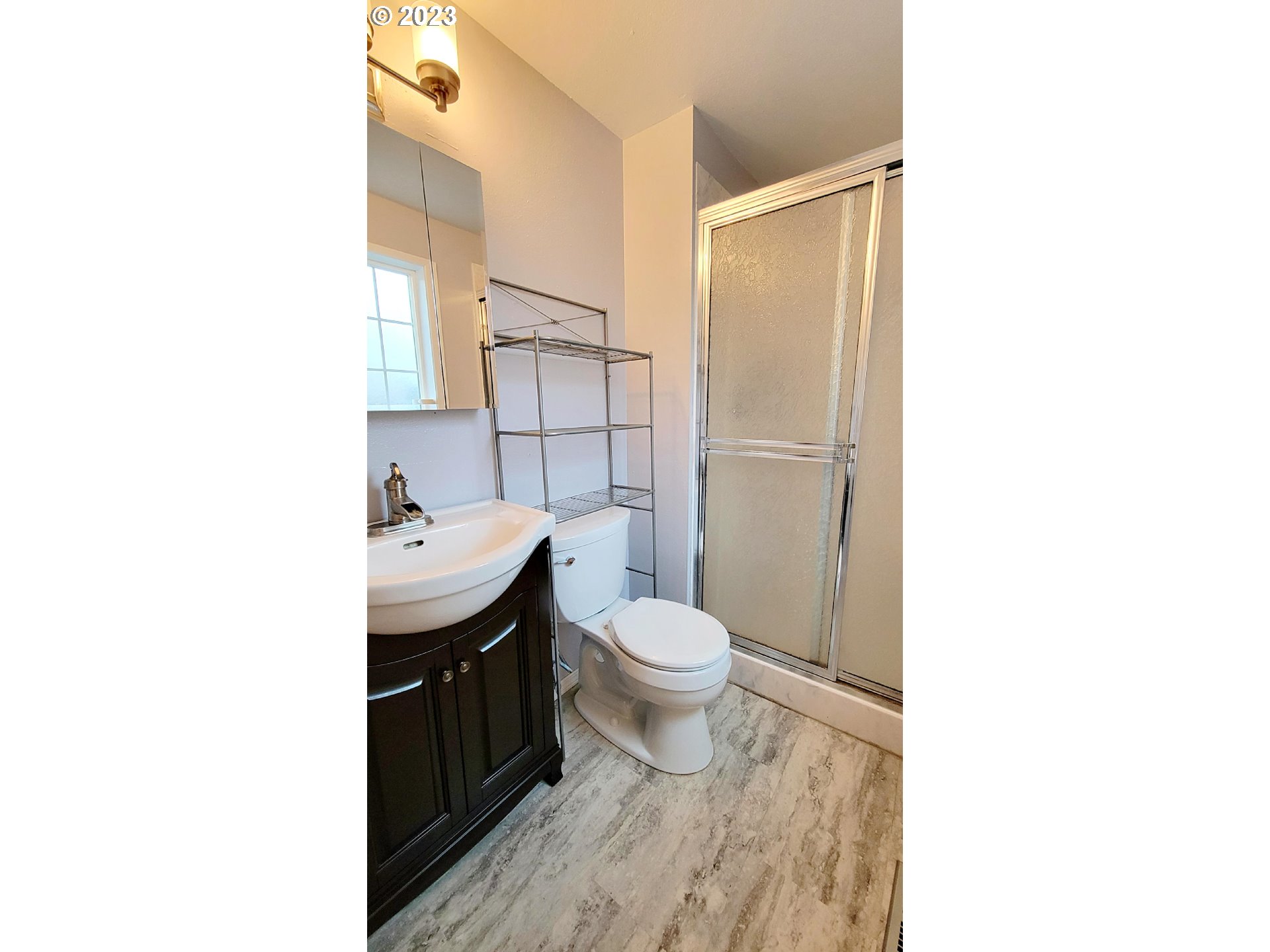 726 Rayner Avenue Springfield, OR 97477 - Photo 6 of 19 a bathroom with a sink a toilet and shower