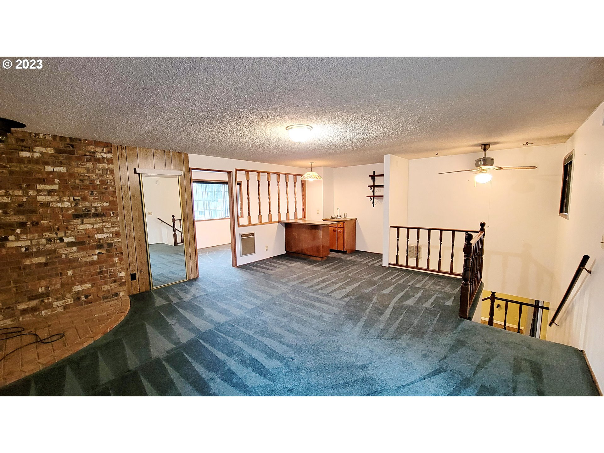 726 Rayner Avenue Springfield, OR 97477 - Photo 10 of 19 a living room with furniture and a wooden floor