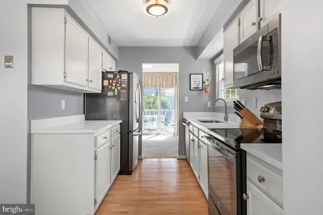 a bed room with a bed and a window