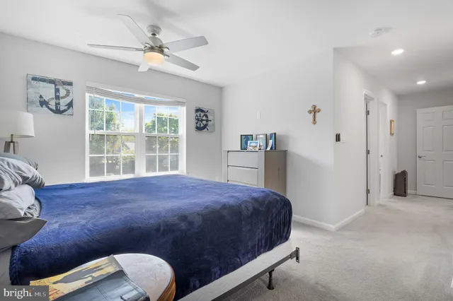 a view of a cafe with sitting area