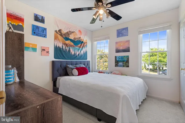 an aerial view of house with yard swimming pool and outdoor seating