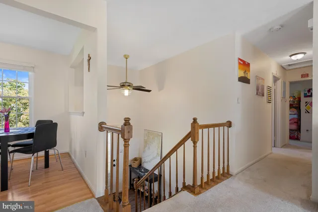 a living room with a couch and a large window