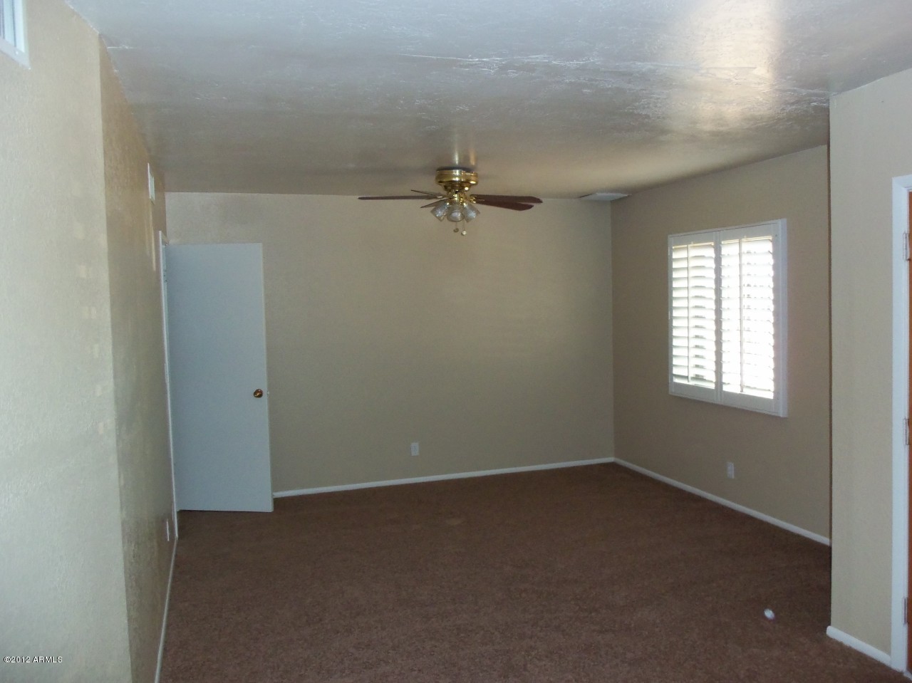6302 West Baseline Road Laveen, AZ 85339 - Photo 6 of 19 Living room 2