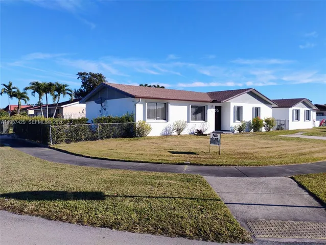 a view of house with outdoor space