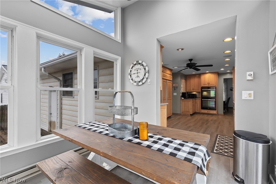 64508 Slade Road Cambridge, OH 43725 - Photo 15 of 50 Dining area with recessed lighting, light wood-style floors, plenty of natural light, and ceiling fan