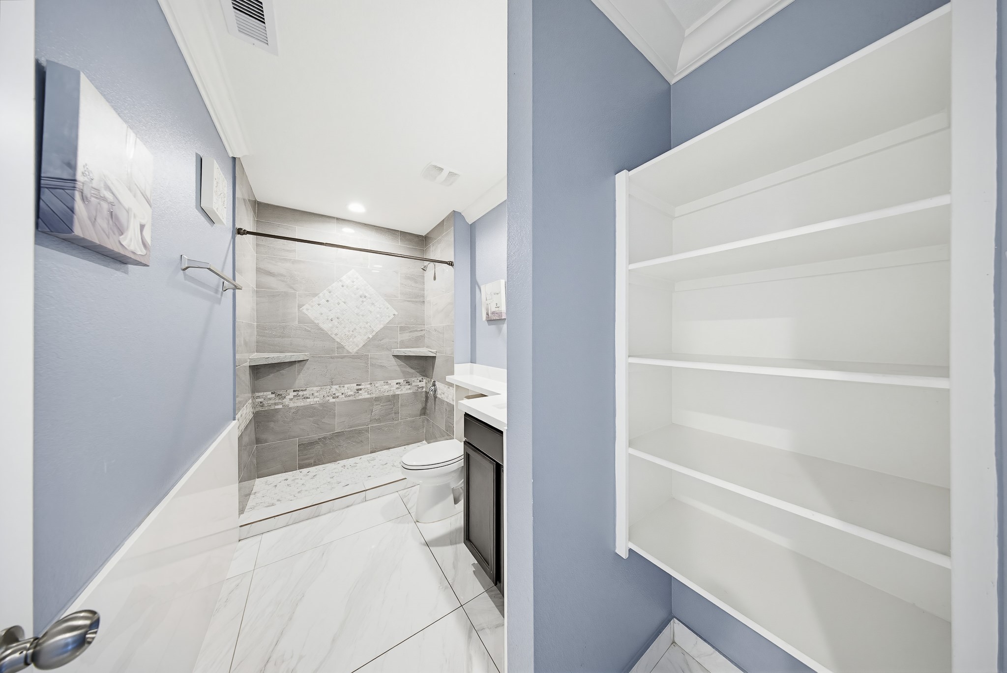 23210 Barberry Crk Trail Spring, TX 77373 - Photo 5 of 33 a bathroom with a bathtub and shower