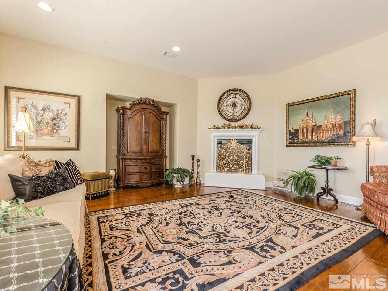 1075 Meridian Ranch Drive Reno, NV 89523 - Photo 4 of 25 a bedroom with furniture and a rug