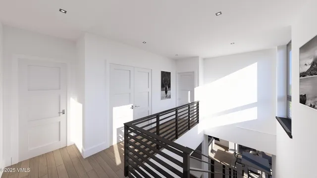 a bedroom with bed and a large window