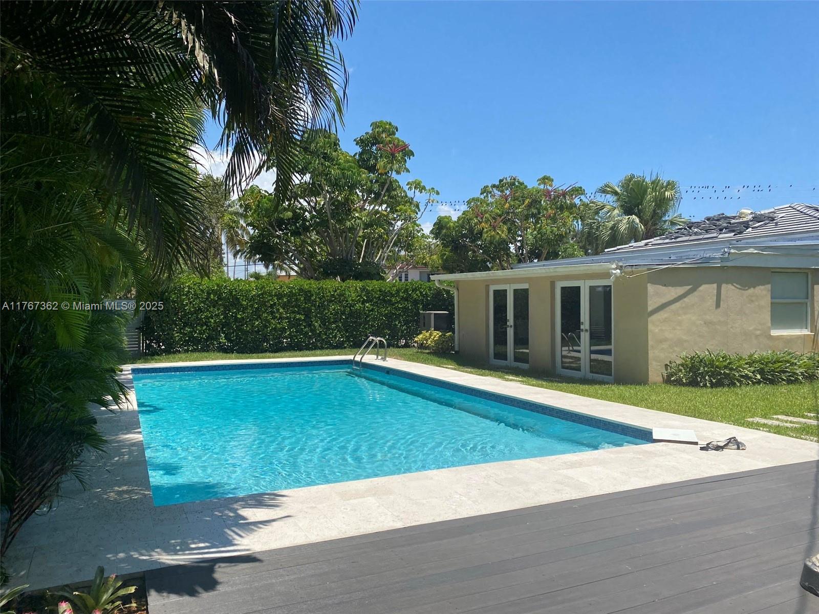 790 Southwest 21st Road Miami, FL 33129 - Photo 12 of 83 a view of a house with pool