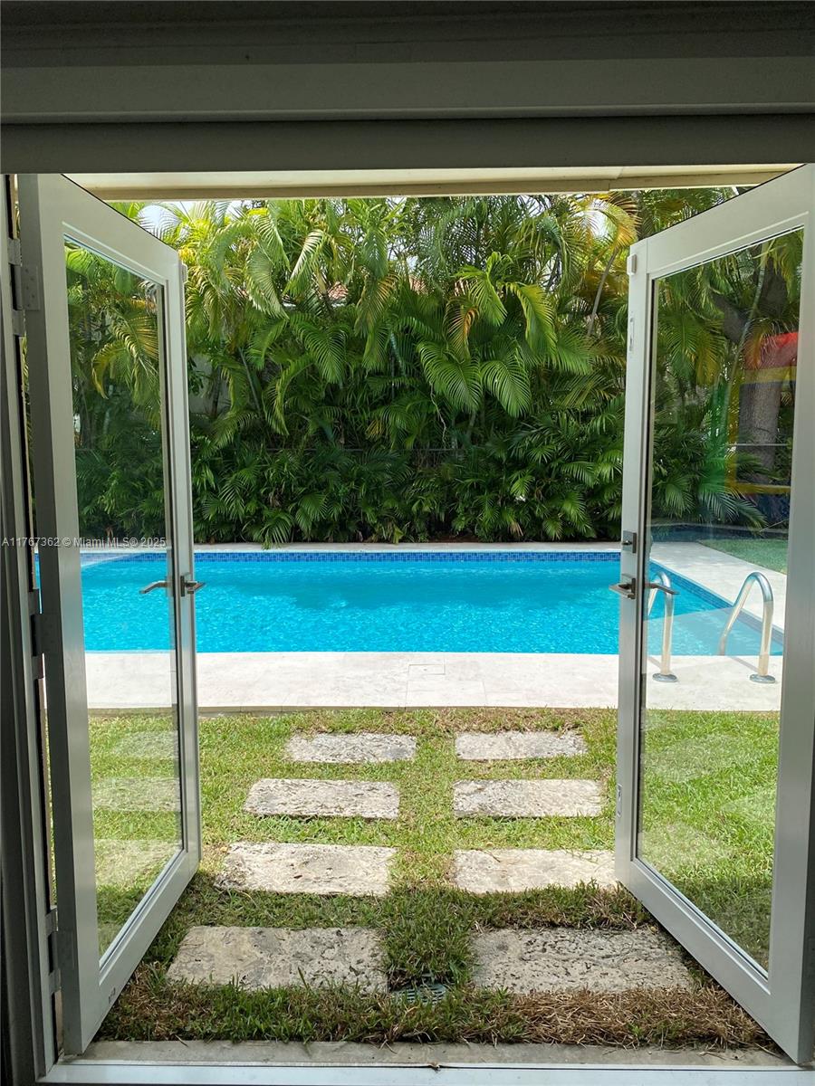 790 Southwest 21st Road Miami, FL 33129 - Photo 21 of 83 Pool House to Pool Area