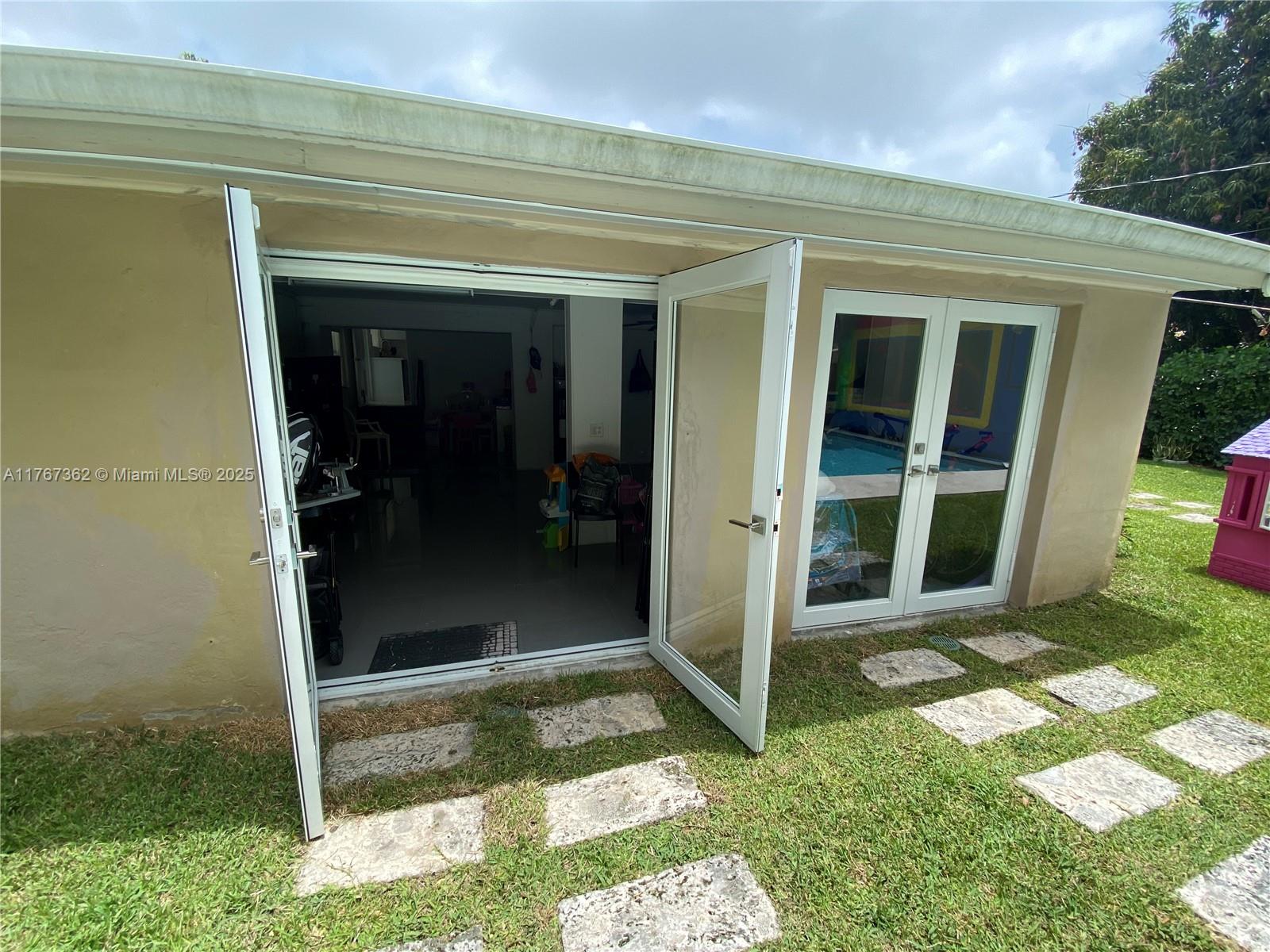 790 Southwest 21st Road Miami, FL 33129 - Photo 22 of 83 View into Pool House, from Pool