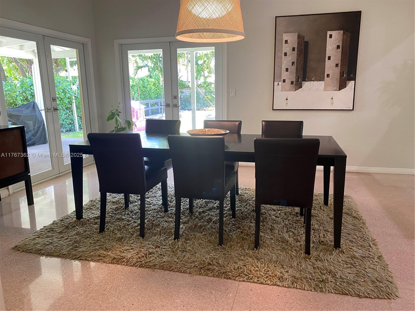 790 Southwest 21st Road Miami, FL 33129 - Photo 29 of 83 a view of a dining room with furniture window and outside view