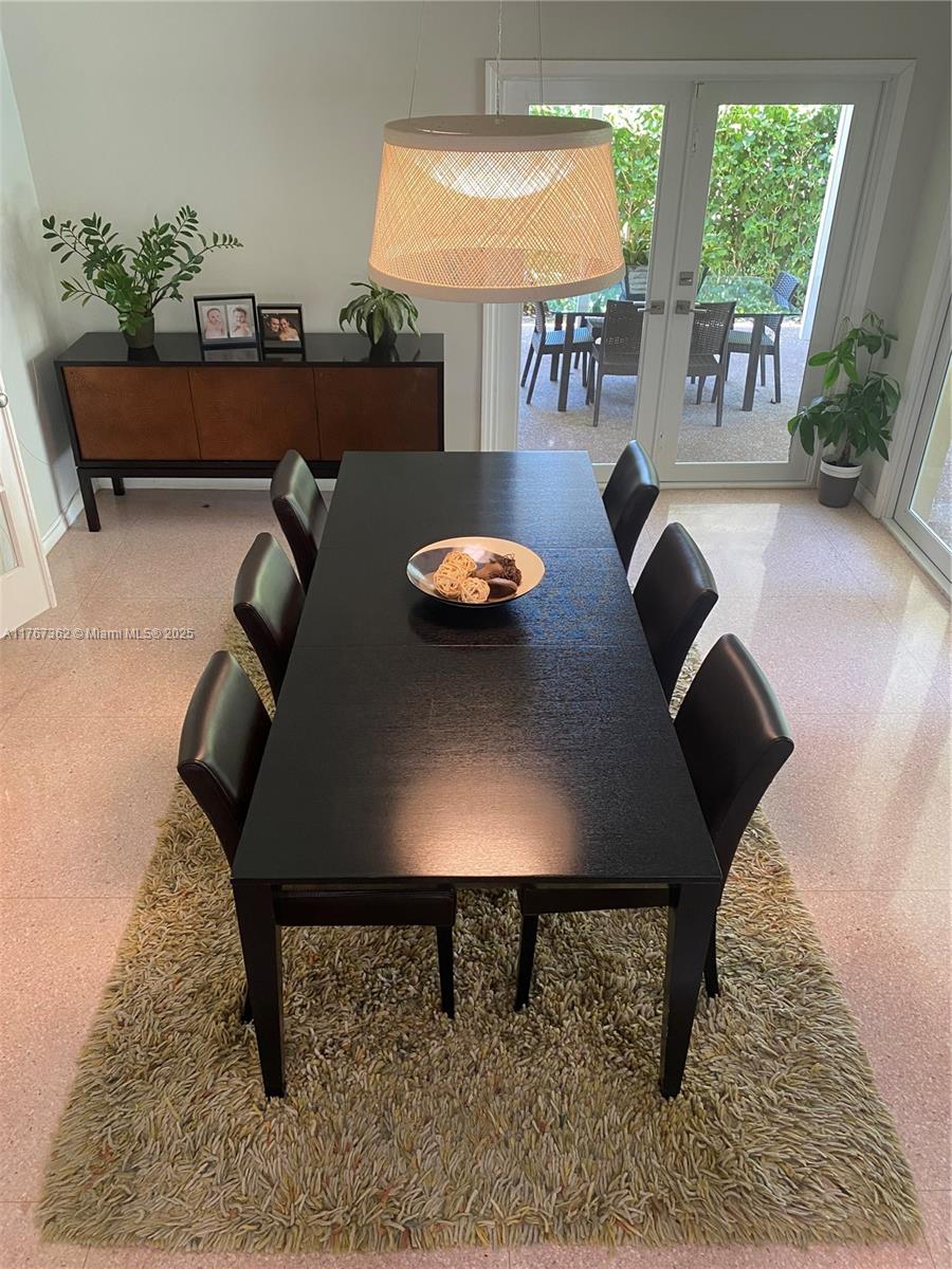 790 Southwest 21st Road Miami, FL 33129 - Photo 31 of 83 a view of a living room and dining room