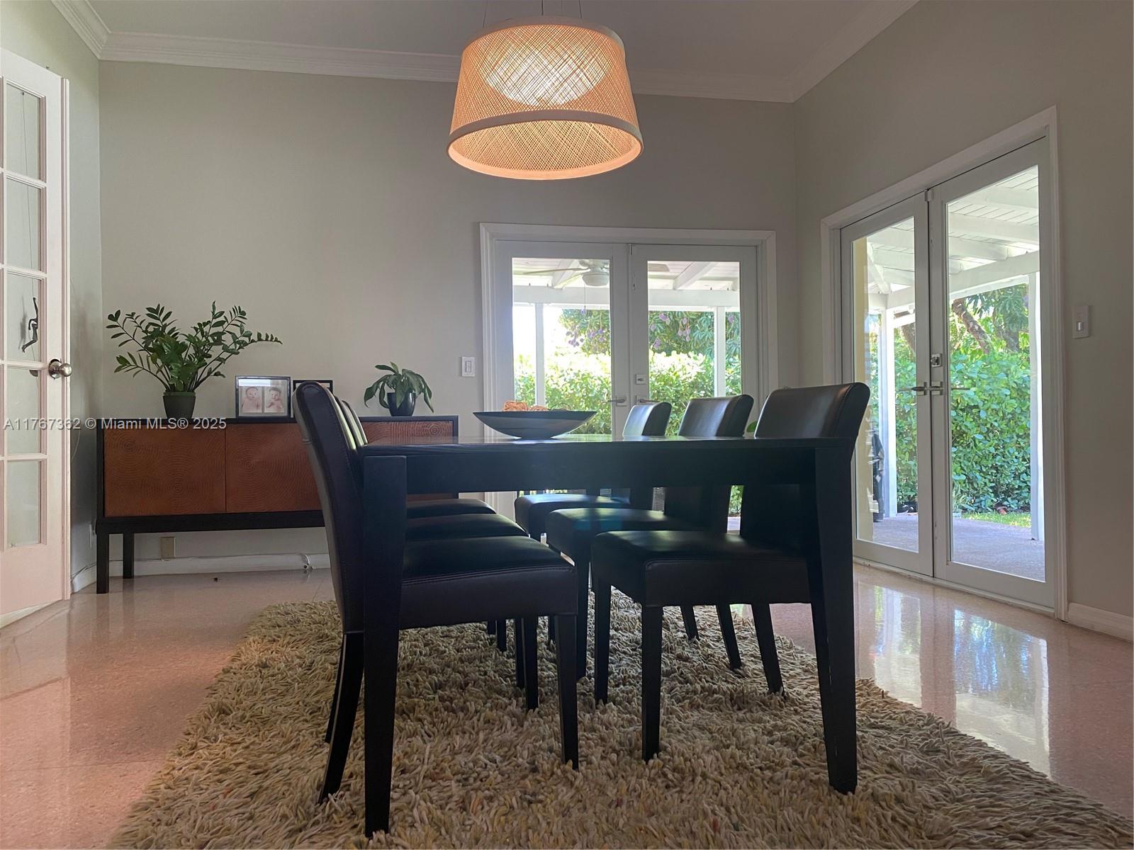 790 Southwest 21st Road Miami, FL 33129 - Photo 32 of 83 a view of a dining room with furniture window and outside view