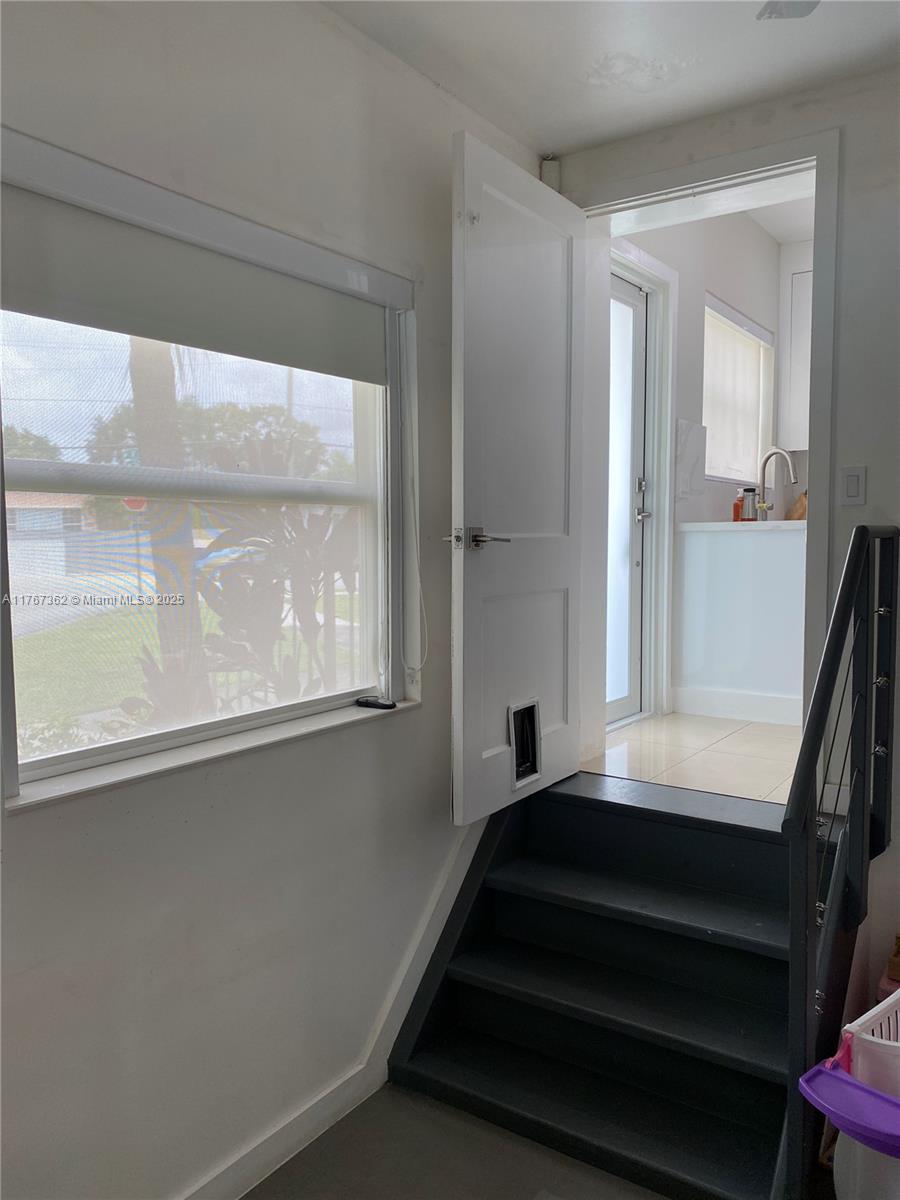 790 Southwest 21st Road Miami, FL 33129 - Photo 53 of 83 Steps down to converted garage