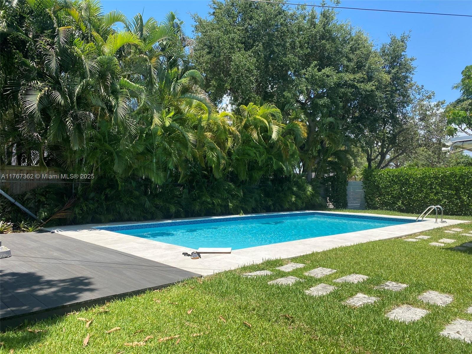 790 Southwest 21st Road Miami, FL 33129 - Photo 10 of 83 a view of field with trees in the background