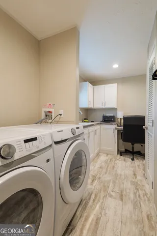 a view of kitchen sink washer and dryer