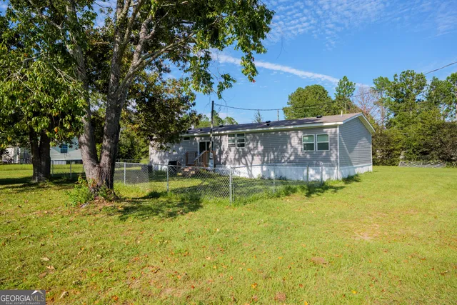 a view of a garden with a bench