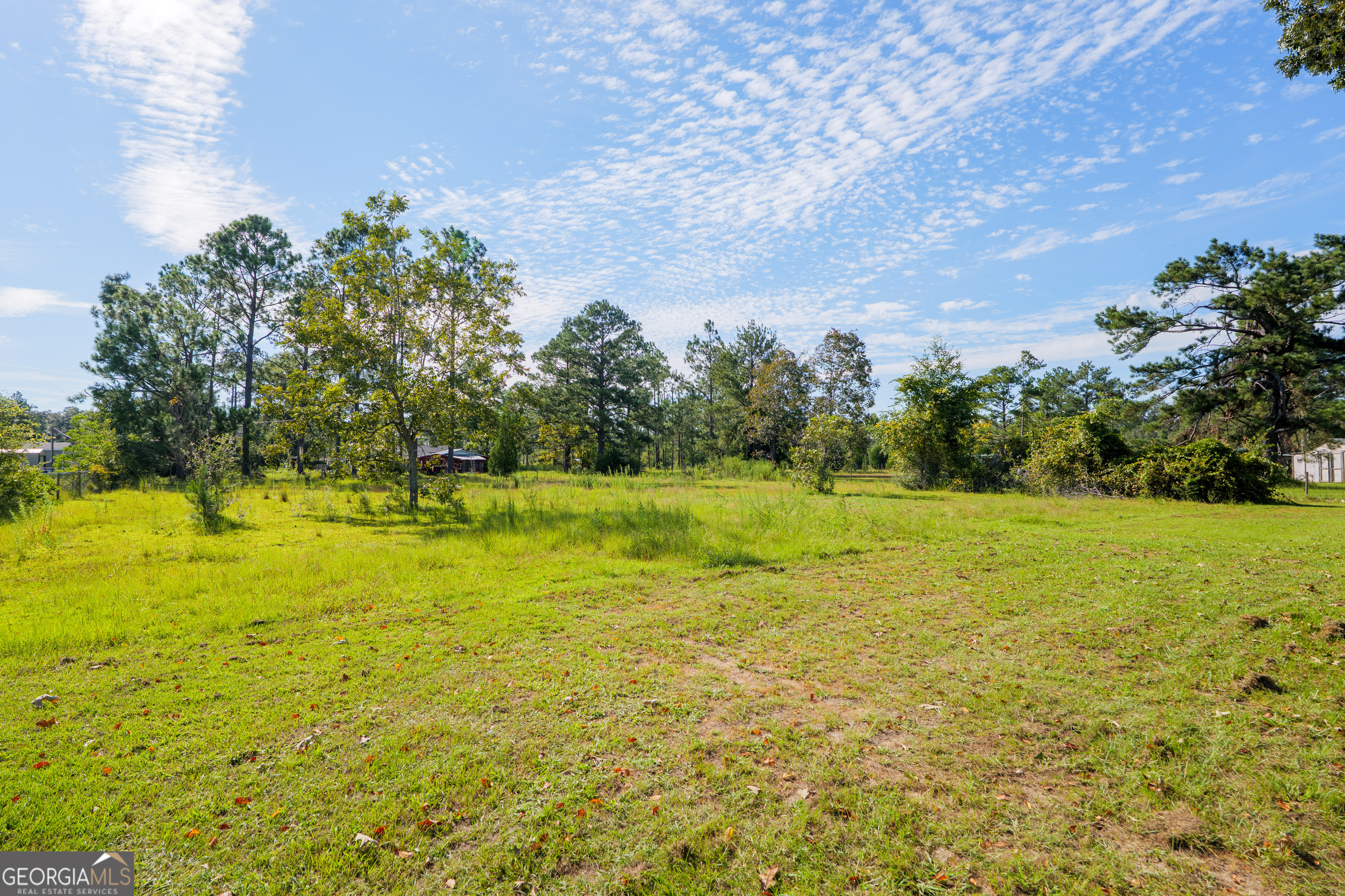 6054 Glenn Road Valdosta, GA 31606 - Photo 39 of 41 a view of yard with swimming pool and green space