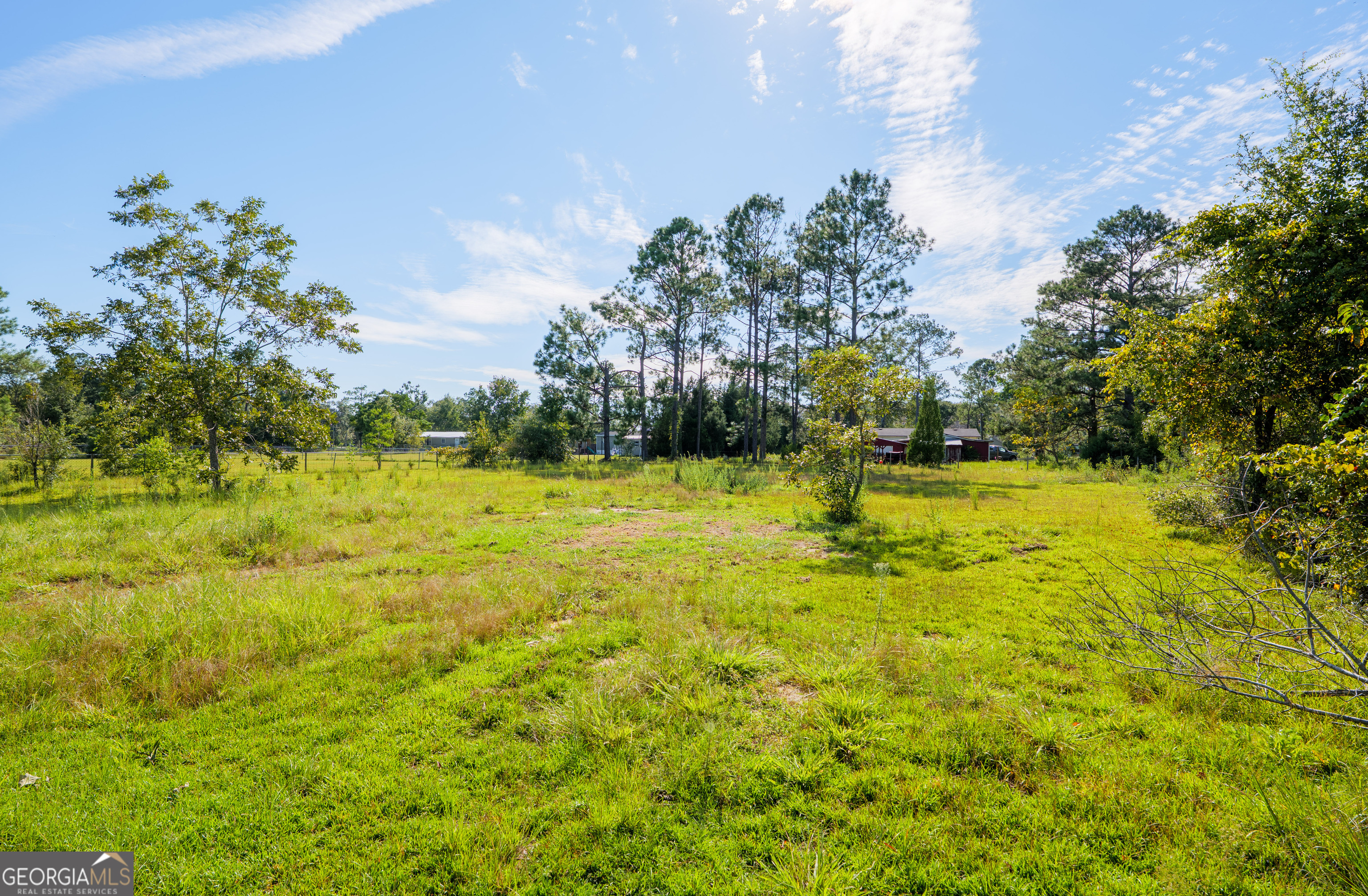 6054 Glenn Road Valdosta, GA 31606 - Photo 41 of 41 a swimming pool with trees in the background
