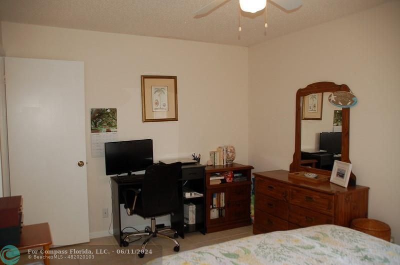 448 Pine Glen Lane, Unit E Greenacres, FL 33463 - Photo 17 of 35 a view of a workspace with furniture
