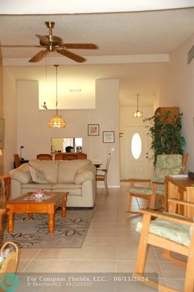 448 Pine Glen Lane, Unit E Greenacres, FL 33463 - Photo 7 of 35 a living room with a sink