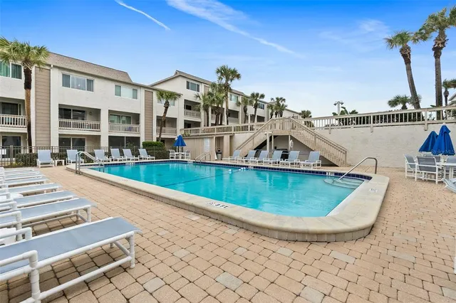 a view of a house with a swimming pool