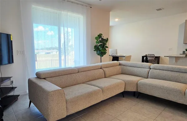 a house view with a garden space