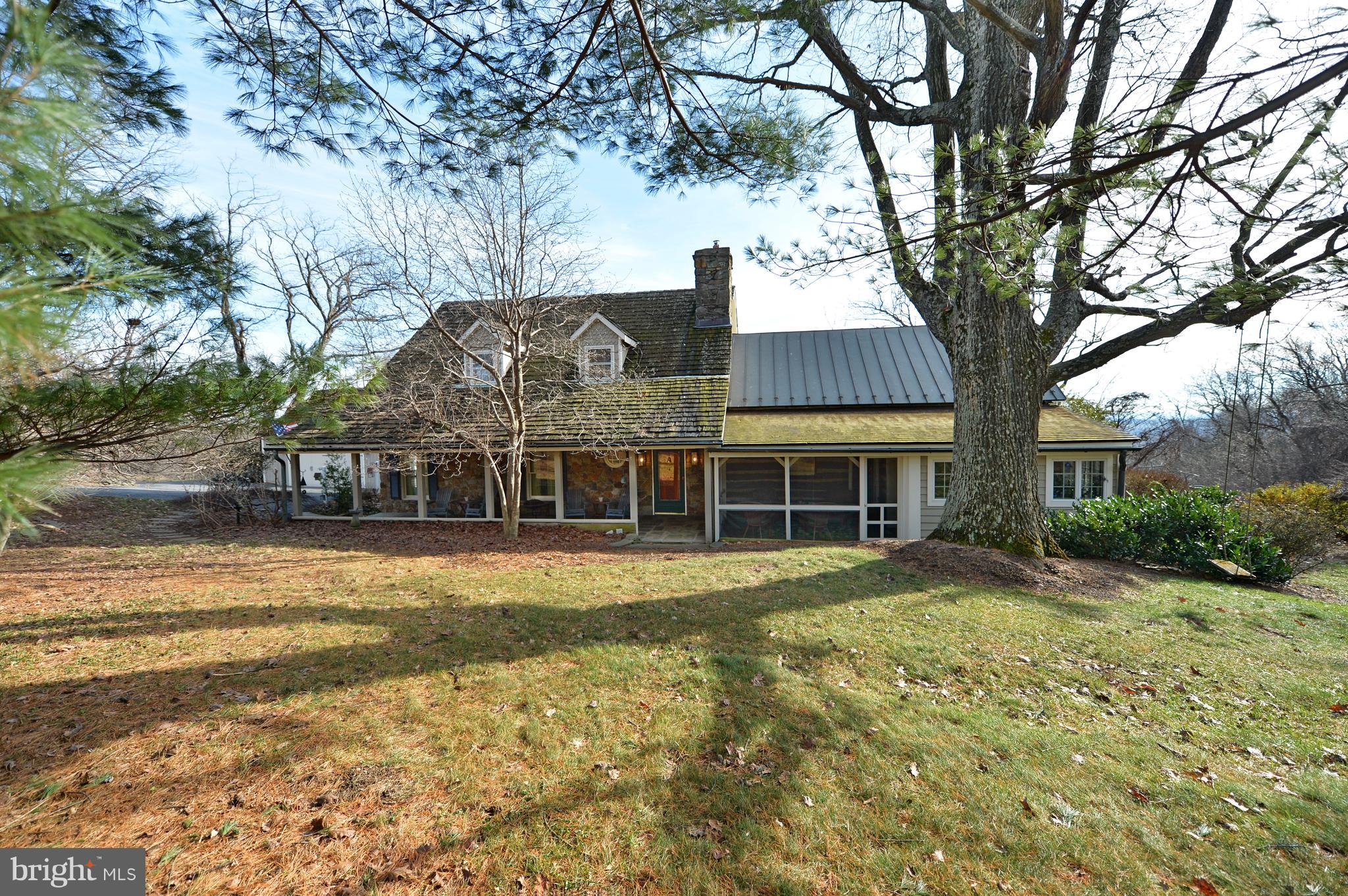 34973 Sunny Ridge Road Round Hill, VA 20141 - Photo 1 of 52 Amazing log home addition and oak tree