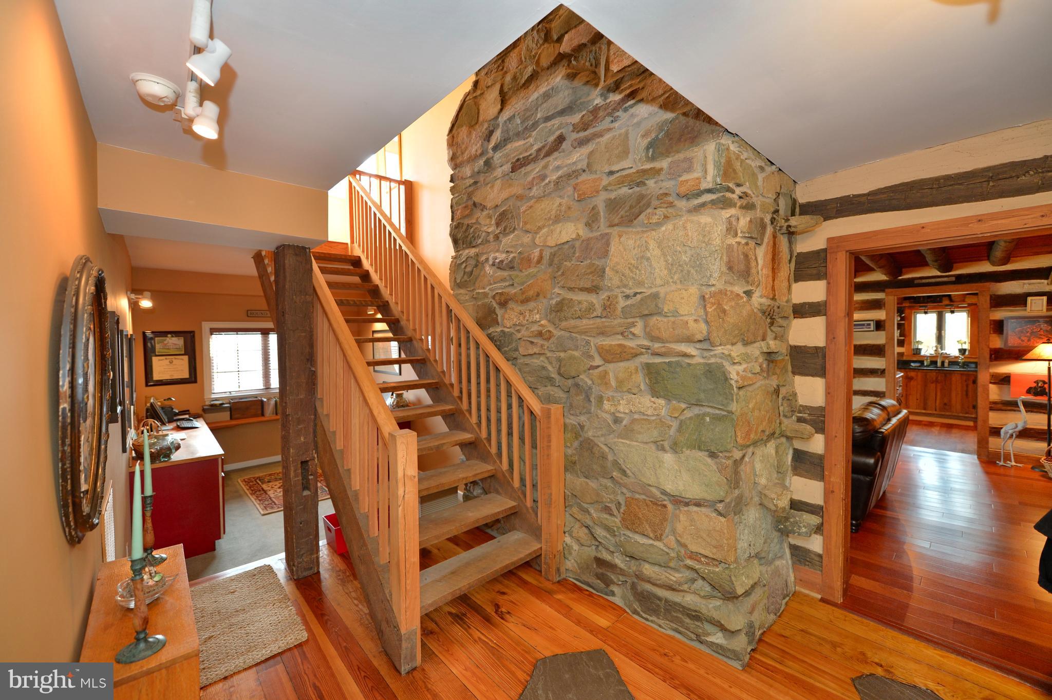 34973 Sunny Ridge Road Round Hill, VA 20141 - Photo 14 of 52 Entry foyer with heart pine floor & stone inlay