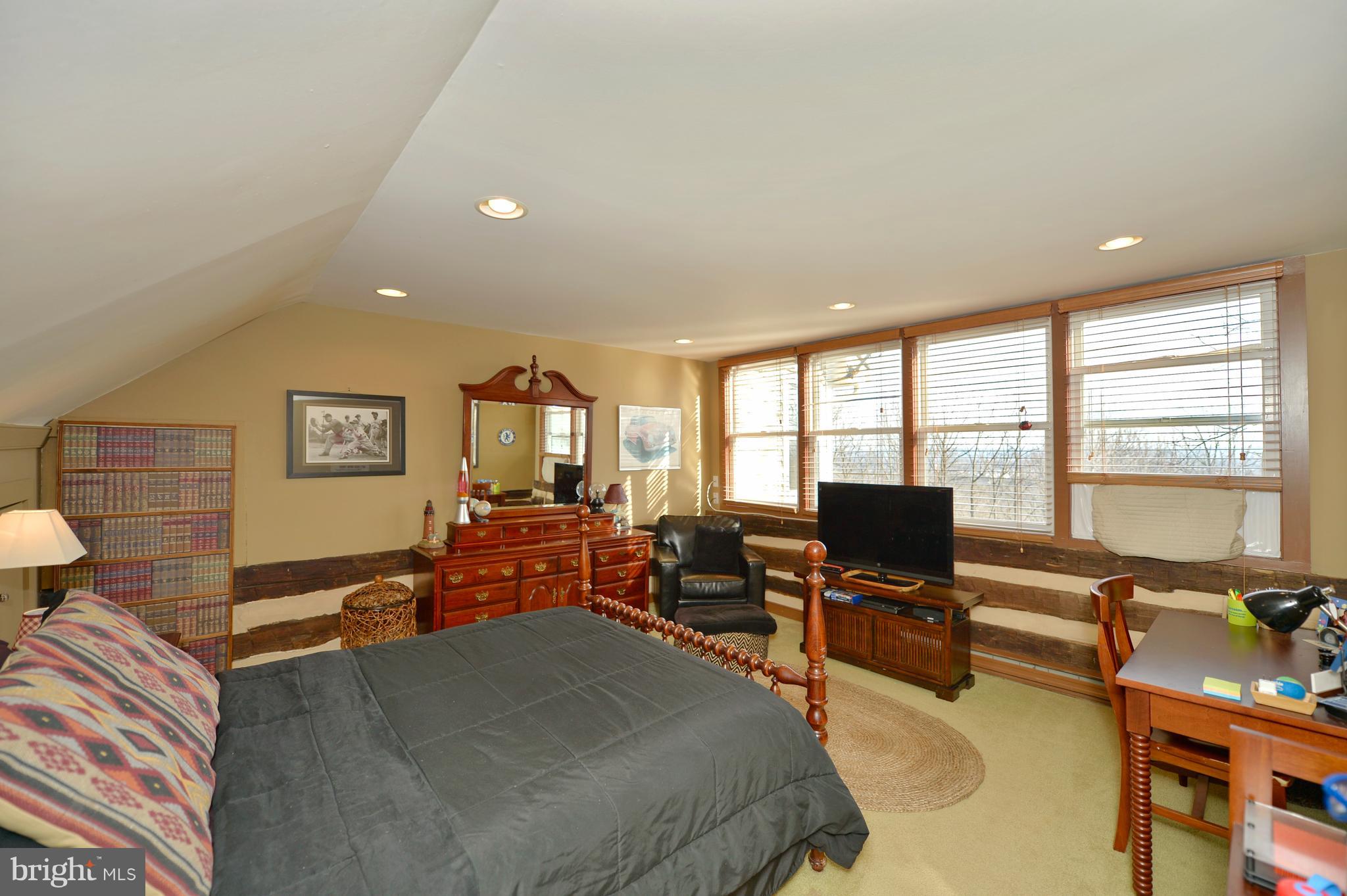 34973 Sunny Ridge Road Round Hill, VA 20141 - Photo 36 of 52 Upper level log cabin bedroom view 1