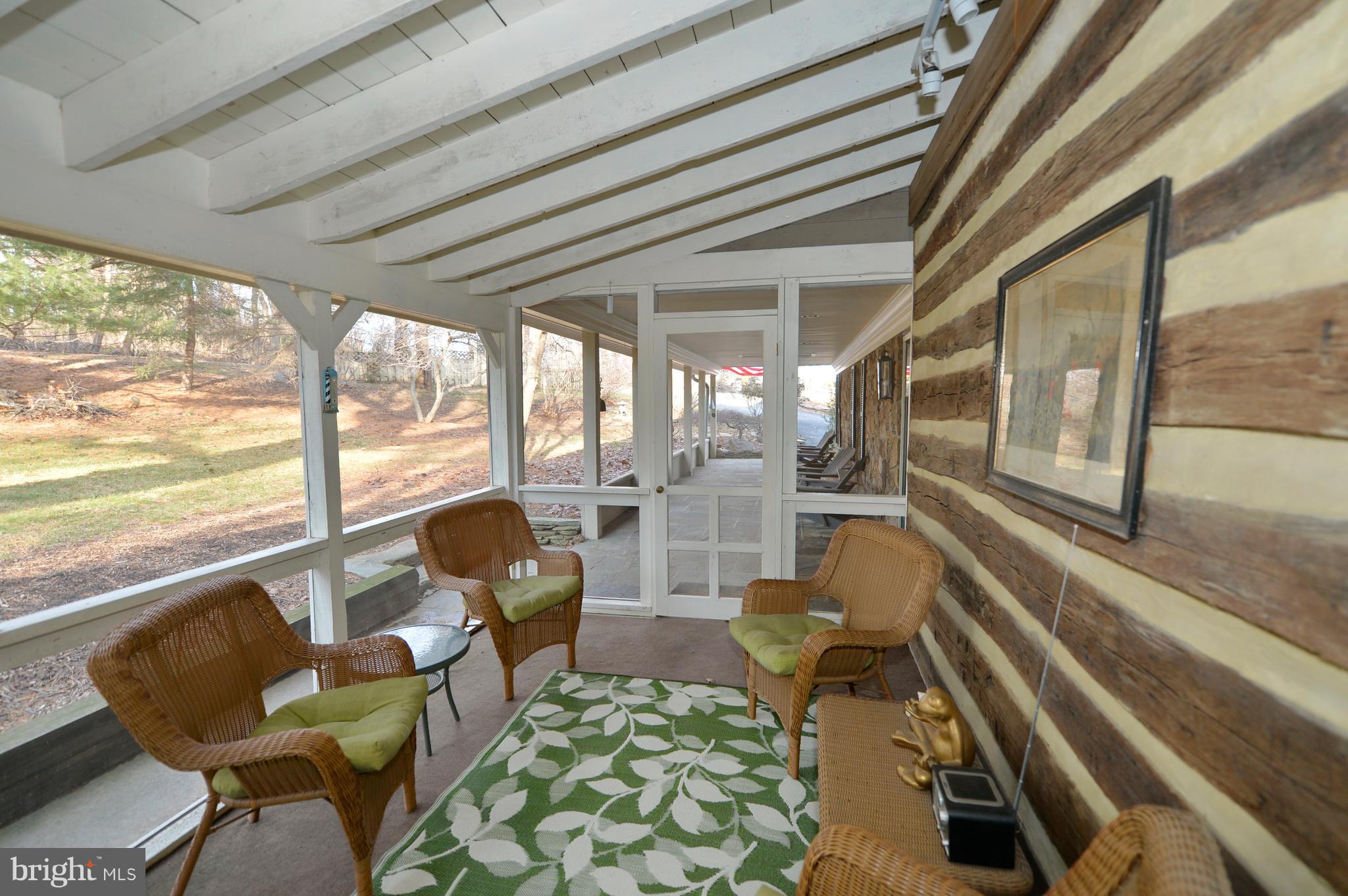 34973 Sunny Ridge Road Round Hill, VA 20141 - Photo 7 of 52 Screened in porch open to the front porch