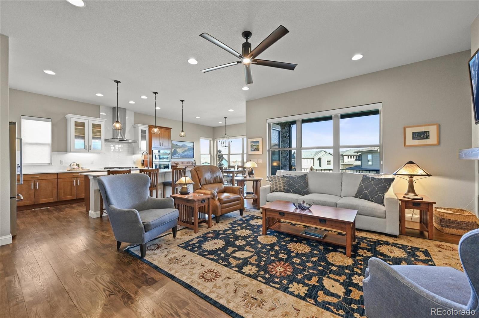 493 Meadowleaf Lane Highlands Ranch, CO 80126 - Photo 15 of 48 a living room with furniture and a view of kitchen