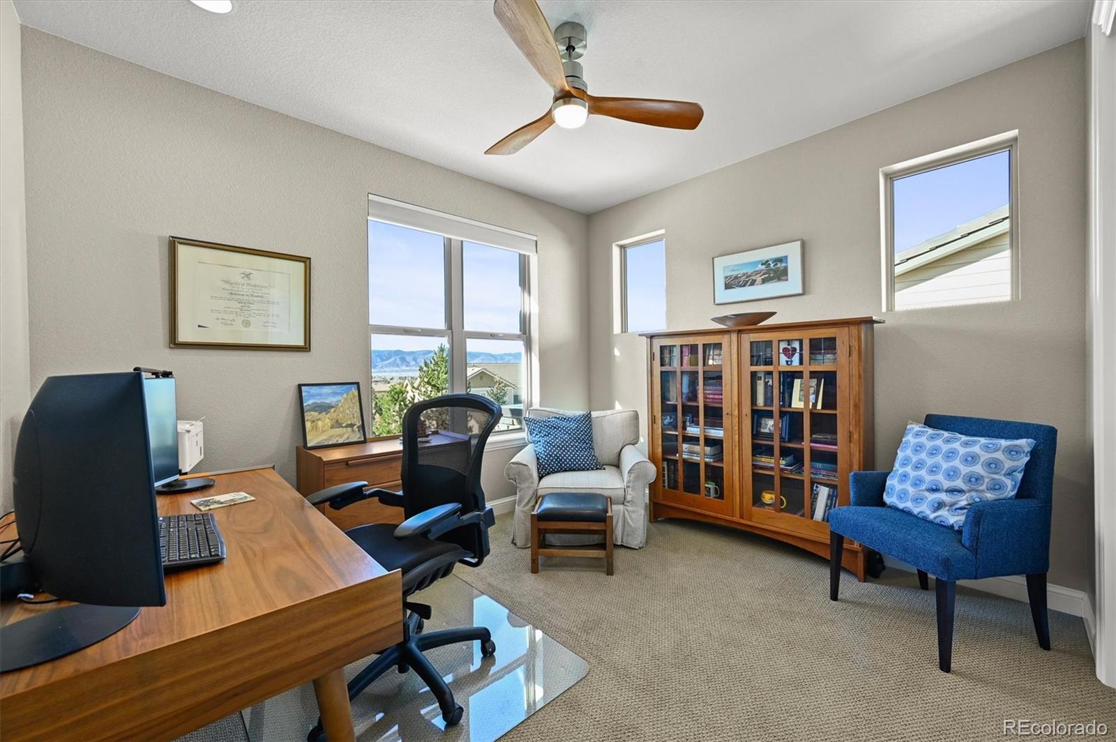 493 Meadowleaf Lane Highlands Ranch, CO 80126 - Photo 26 of 48 a work room with furniture and windows
