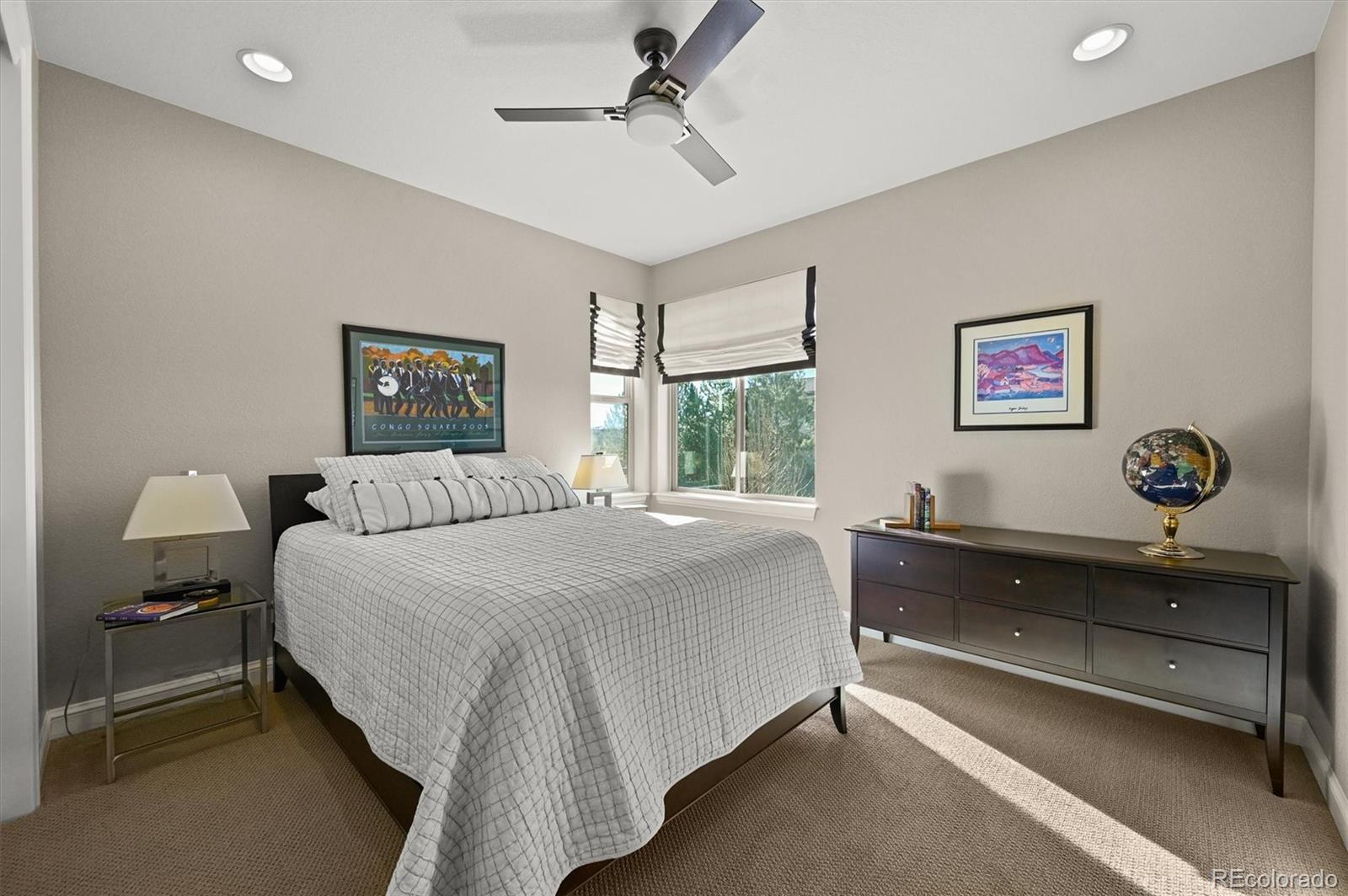 493 Meadowleaf Lane Highlands Ranch, CO 80126 - Photo 27 of 48 a bedroom with a bed and a window