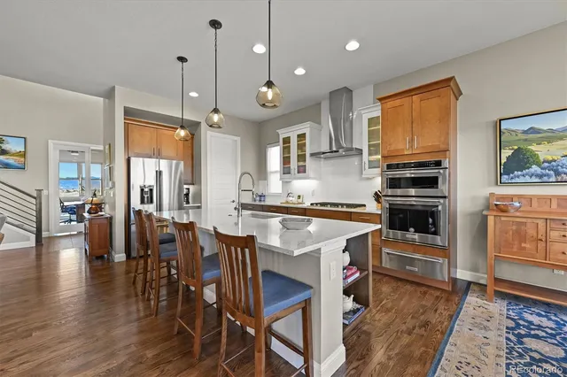a kitchen with a stove and a microwave