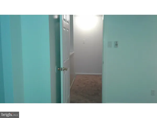 a view of a room with a large window