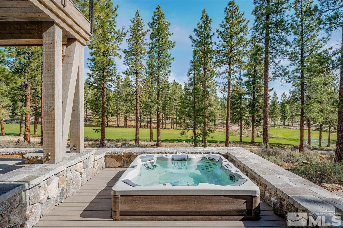 182 Tor Court Carson City, NV 89705 - Photo 18 of 40 a view of backyard with swimming pool and outdoor seating