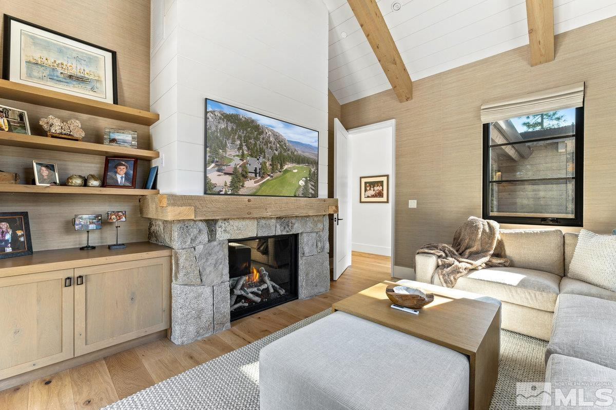 182 Tor Court Carson City, NV 89705 - Photo 20 of 40 a living room with furniture and a fireplace