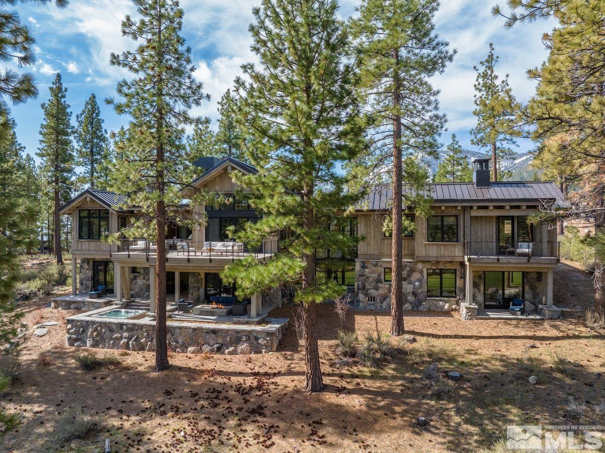 182 Tor Court Carson City, NV 89705 - Photo 2 of 40 a front view of a house with a tree