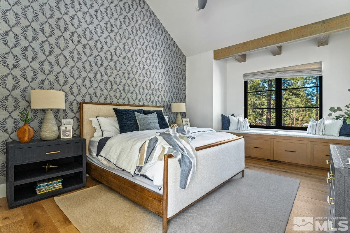 182 Tor Court Carson City, NV 89705 - Photo 22 of 40 a bed room with a bed and a window