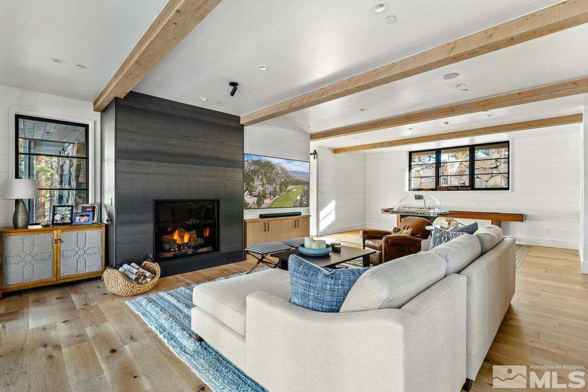 182 Tor Court Carson City, NV 89705 - Photo 27 of 40 a living room with furniture and a fireplace