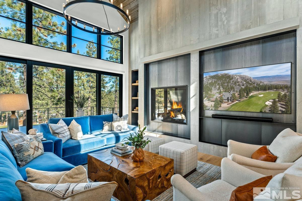 182 Tor Court Carson City, NV 89705 - Photo 5 of 40 a living room with furniture a rug and a large window