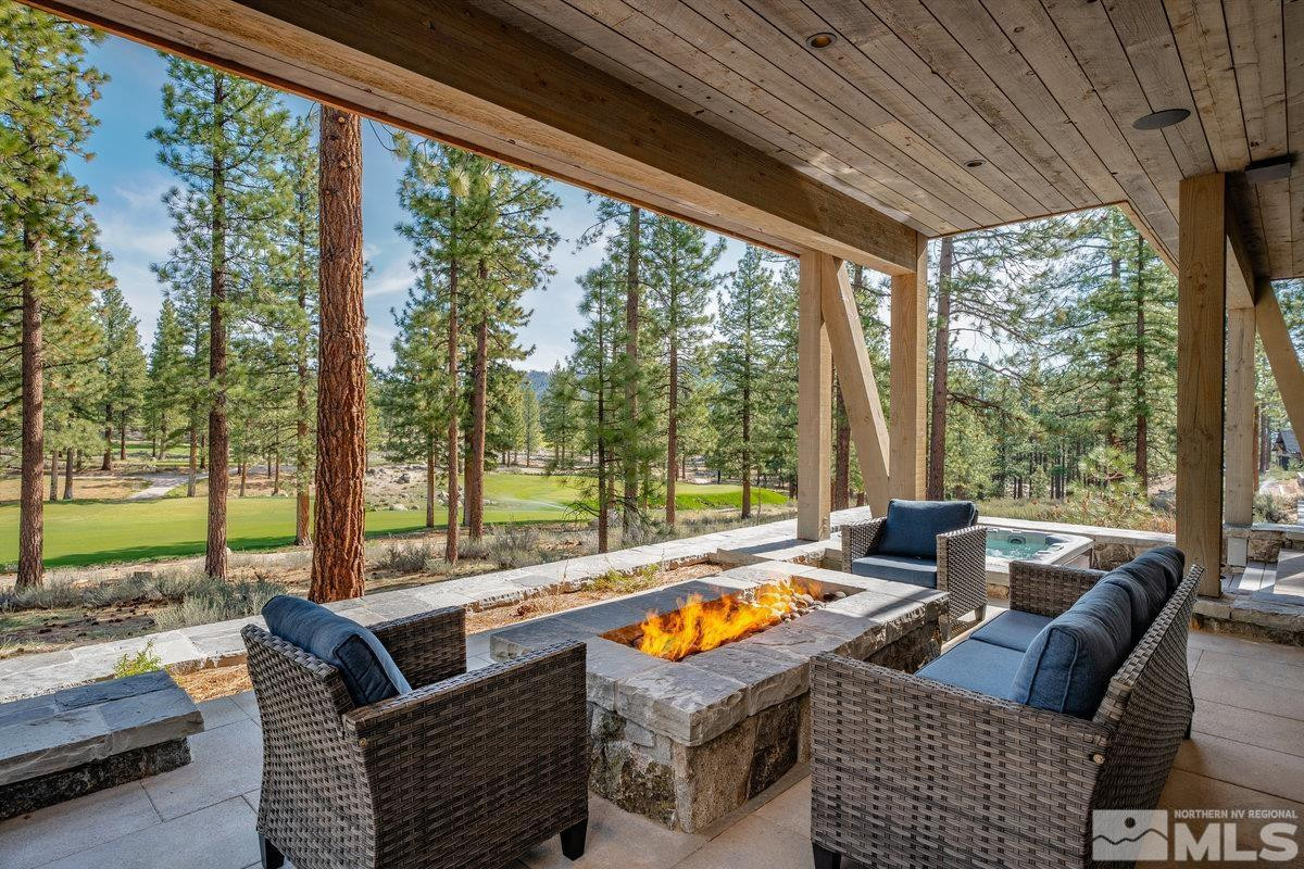182 Tor Court Carson City, NV 89705 - Photo 6 of 40 a living room with furniture and a floor to ceiling window