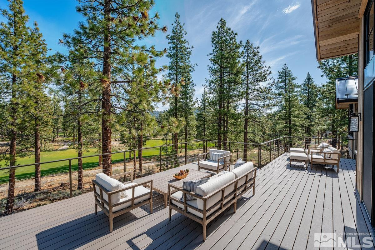 182 Tor Court Carson City, NV 89705 - Photo 7 of 40 a view of a roof deck with couches and wooden floor